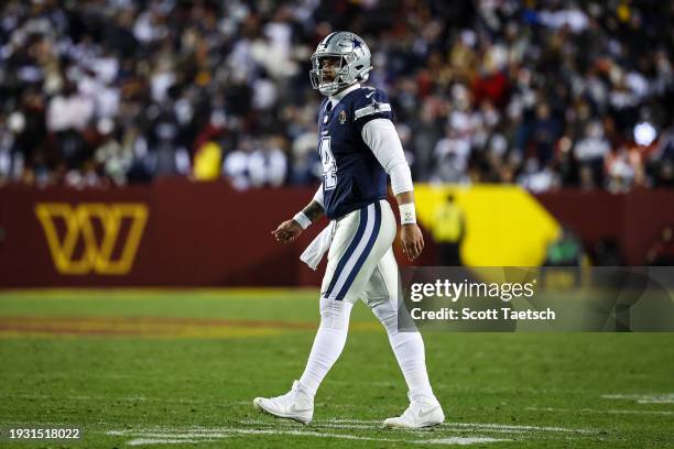 Dak Prescott of the Dallas Cowboys looks on against the Washington Commanders during the second half of the game at FedExField on January 7, 2024 in...