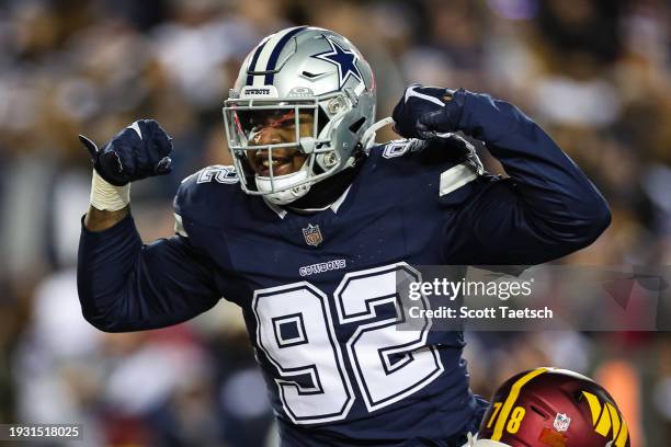 Abdullah Anderson of the Washington Commanders celebrates after a sack against the Washington Commanders during the second half of the game at...