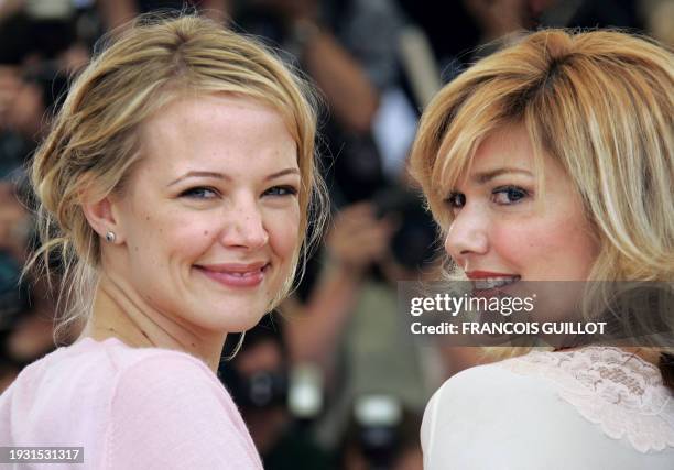 Actress Pell James smiles at photographers as she poses with Mexican actress Laura Harring during a photo call for British director James Marsh's...