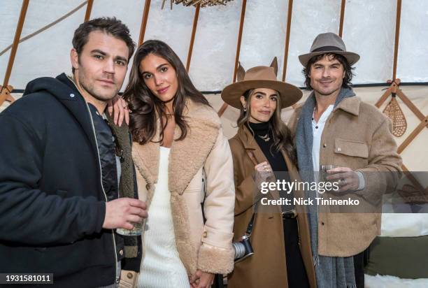 Paul Wesley, Natalie Kuckenburg, Nikki Reed, and Ian Somerhalder attend the Snow Lodge Revolve Apre Ski with Music by Rampa at The Snow Lodge on...