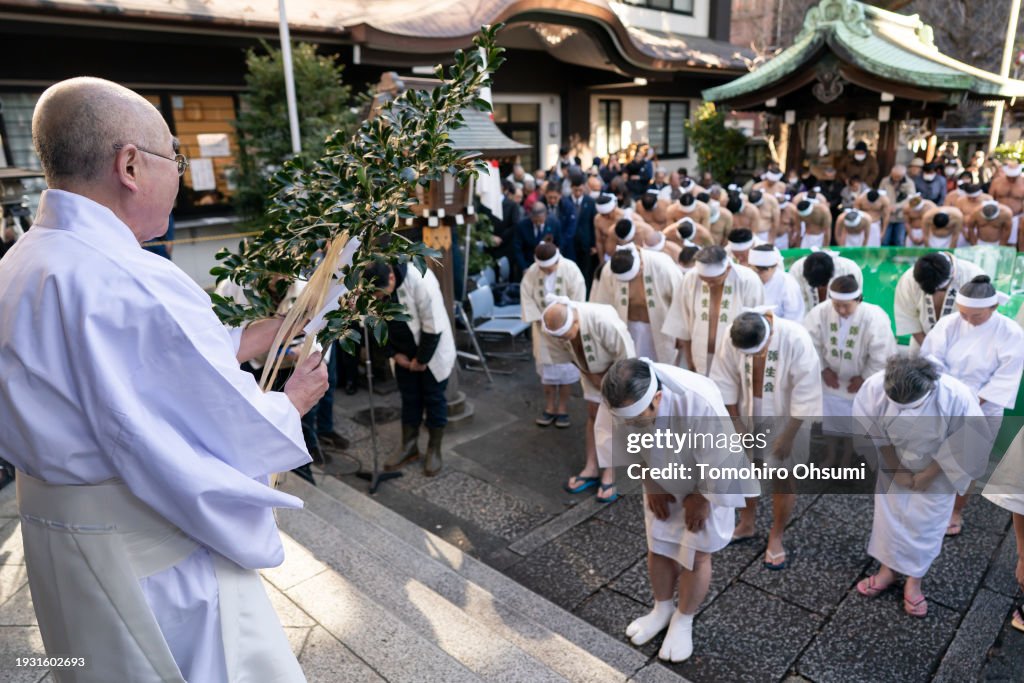 Worshippers Purify With Icy Water In Tokyo