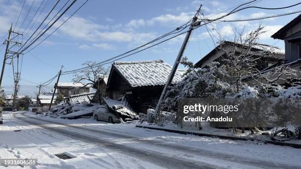 View of earthquake-affected buildings and roads buried under snow in Noto Peninsula, where many earthquakes occurred in early January and killed at...