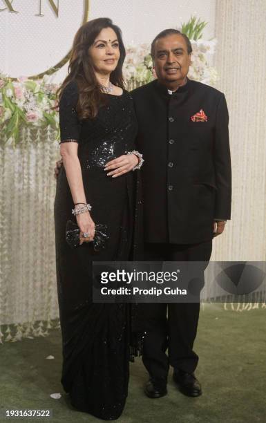 Nita Ambani and Mukesh Ambani attend the Nupur Shikhare and Ira Khan wedding reception on January 13, 2024 in Mumbai, India.