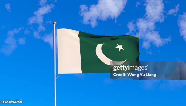 pakistan flag with blue sky background - pakistani flag stock pictures, royalty-free photos & images