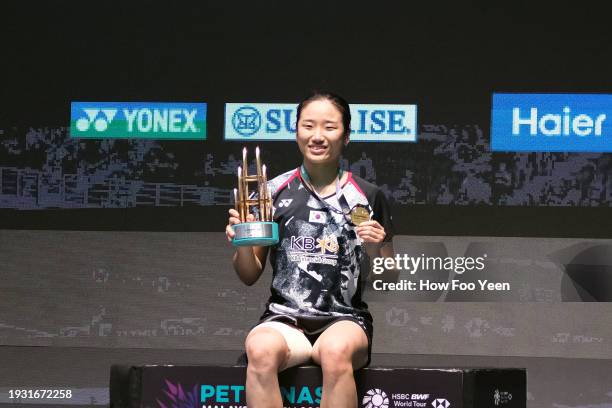 An Se Young of Korea poses at the victory ceremony after winning aginst Zhang Yi Man of China in their women singles final during day 6 of the...