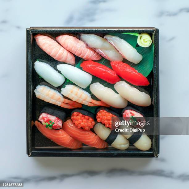elegant assortment of sushi delights - ikura stock pictures, royalty-free photos & images