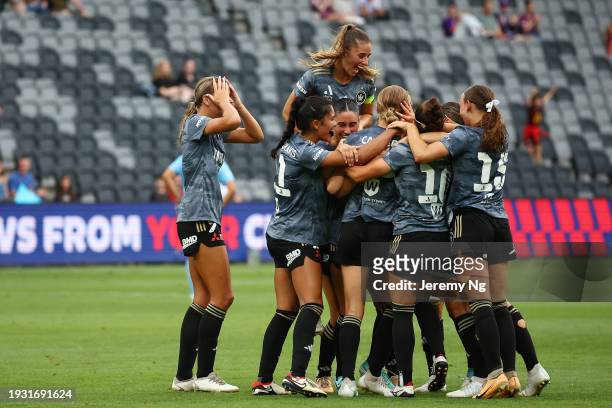 Holly Caspers of the Wanderers celebrates scoring a goal with her teammates during the A-League Women round 12 match between Western Sydney Wanderers...