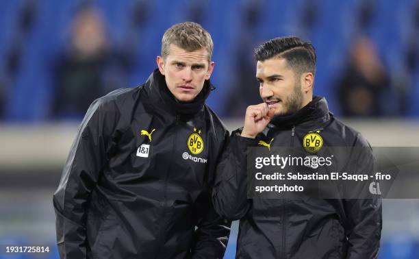 Assistant coach Sven Bender of Borussia Dortmund and Assistant coach Nuri Sahin of Borussia Dortmund look on ahead of the Bundesliga match between SV...