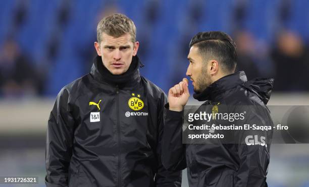 Assistant coach Sven Bender of Borussia Dortmund and Assistant coach Nuri Sahin of Borussia Dortmund look on ahead of the Bundesliga match between SV...