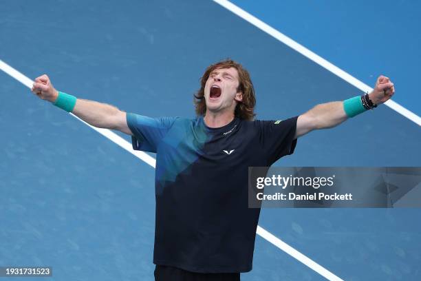 Andrey Rublev celebrates match point in their round one singles match against Thiago Seyboth Wild of Brazil during day one of the 2024 Australian...