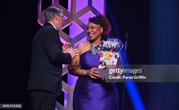 Bill Schneider and Dr. Bernice A. King onstage during the 2024 Beloved Community Awards at Hyatt Regency Atlanta on January 13, 2024 in Atlanta,...