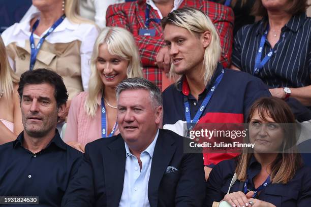 Darcy Moore, Mark Webber and Eddie McGuire attend the round one singles match between Novak Djokovic of Serbia and Dino Prizmic of Croatia at Rod...