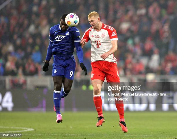Stanley Nsoki of TSG Hoffenheim and Matthijs de Ligt of FC Bayern München compete for the ball during the Bundesliga match between FC Bayern München...