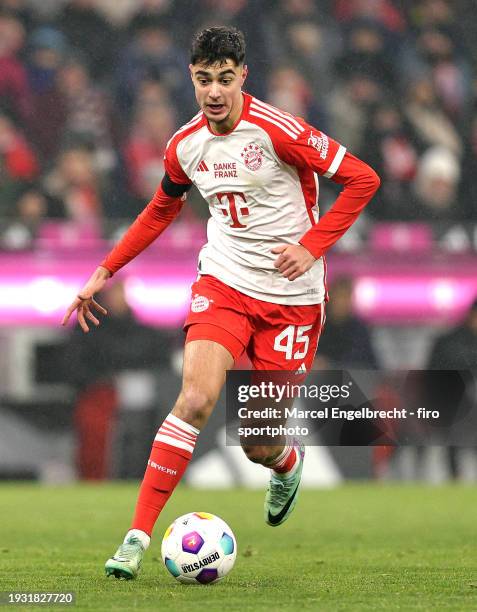 Aleksandar Pavlovic of FC Bayern München plays the ball during the Bundesliga match between FC Bayern München and TSG Hoffenheim at Allianz Arena on...