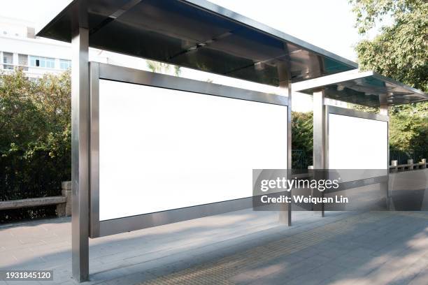 bus stop billboard - bus advertising stock pictures, royalty-free photos & images