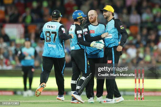 Lloyd Pope of the Strikers celebrates taking the wicket of Alex Ross of the Thunder during the BBL match between Sydney Thunder and Adelaide Strikers...