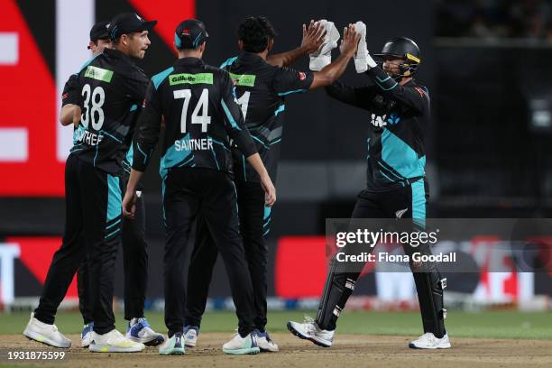 Devon Conway of New Zealand celebrates a wicket during game two of the Twenty20 series between New Zealand and Pakistan at Seddon Park on January 14,...