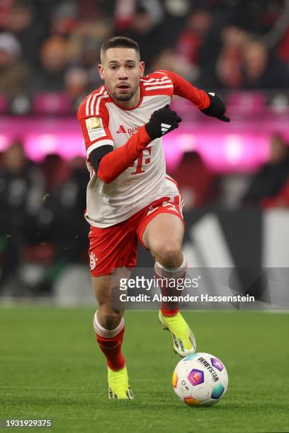 Raphael Guerreiro of FC Bayern München runs with the ball during the Bundesliga match between FC Bayern München and TSG Hoffenheim at Allianz Arena...