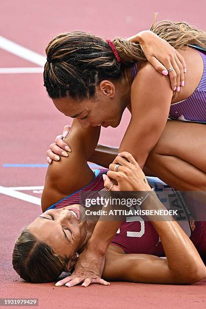 Britain's Katarina Johnson-Thompson and USA's Anna Hall react after the women's heptathlon 800m during the World Athletics Championships at the...