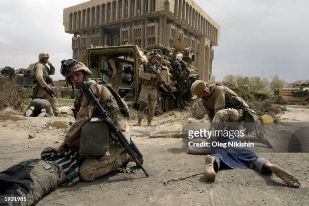 Soldiers detain suspected thieves April 15, 2003 in Baghdad, Iraq. The U.S. Military presence has shifted to policing in an attempt to stabilize the...