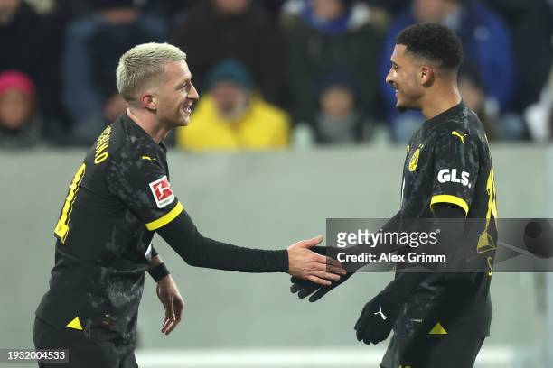 Marco Reus of Borussia Dortmund celebrates the team's second goal with teammate Jadon Sancho during the Bundesliga match between SV Darmstadt 98 and...