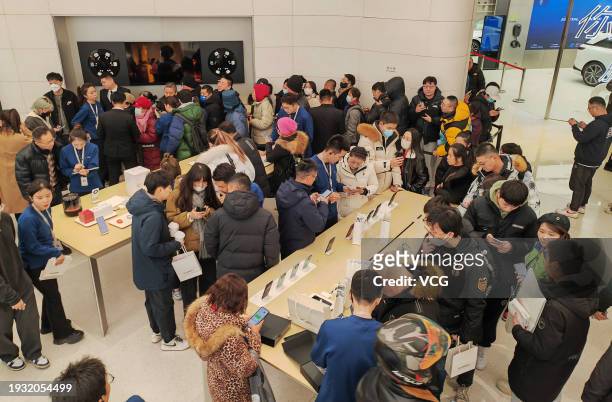 People visit Huawei's flagship store on January 13, 2024 in Beijing, China. Huawei's first flagship store in Beijing opened on January 13.