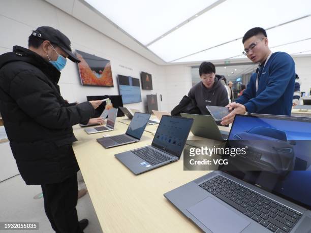 People visit Huawei's flagship store on January 13, 2024 in Beijing, China. Huawei's first flagship store in Beijing opened on January 13.