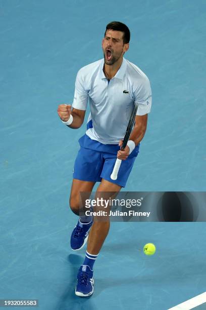 Novak Djokovic of Serbia celebrates winning set point in their round one singles match against Dino Prizmic of Croatia during day one of the 2024...