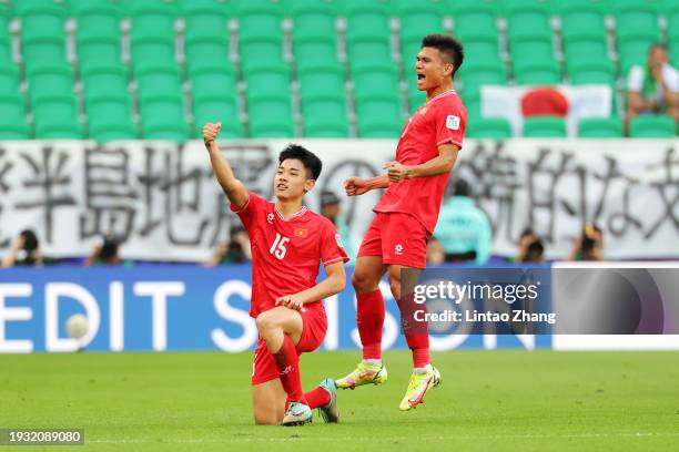 Nguyen Dinh Bac of Vietnam celebrates scoring his team's first goal during the AFC Asian Cup Group D match between Japan and Vietnam at Al Thumama...