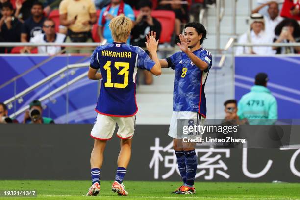 Takumi Minamino of Japan celebrates with teammate, Keito Nakamura... News  Photo - Getty Images
