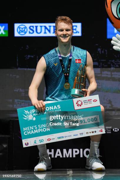 Anders Antonsen of Denmark poses with his trophy on the podium after the Men's Singles Final match against Shi Yuqi of China during day six of the...