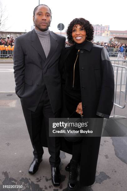 John David Washington and Pauletta Washington arrive at the Prada fashion show during the Milan Menswear Fall/Winter 2024-2025 on January 14, 2024 in...