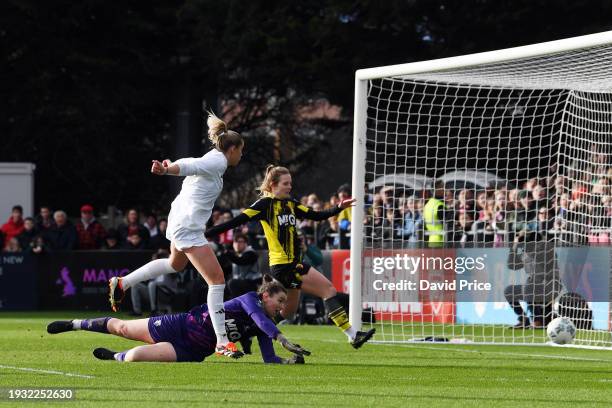 Alessia Russo of Arsenal scores her team's first goal during the Adobe Women's FA Cup Fourth Round match between Arsenal Women and Watford Women at...