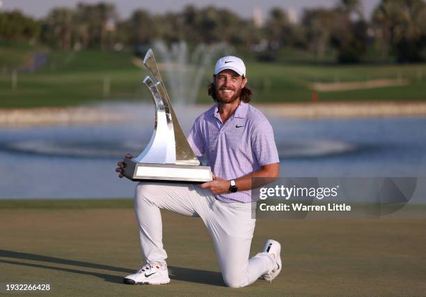 Tommy Fleetwood of England poses with the trophy after winning the Dubai Invitational at Dubai Creek Golf and Yacht Club on January 14, 2024 in...