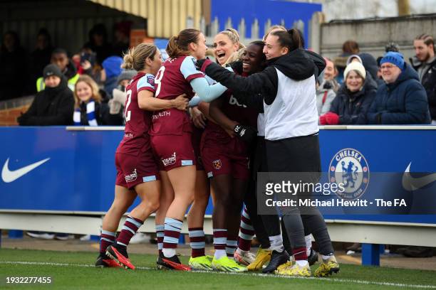 Viviane Asseyi of West Ham United celebrates with teammates after scoring their team's first goal during the Adobe Women's FA Cup Fourth Round match...