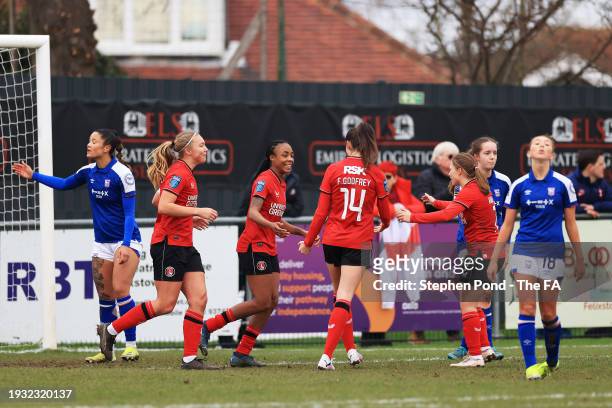 Melissa Johnson of Charlton Athletic celebrates with team mates after scoring their team's second goal during the Adobe Women's FA Cup Fourth Round...