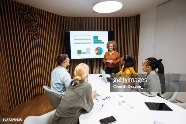 business presentation and teamwork in modern corporate office - afro caribbean and american stock pictures, royalty-free photos & images
