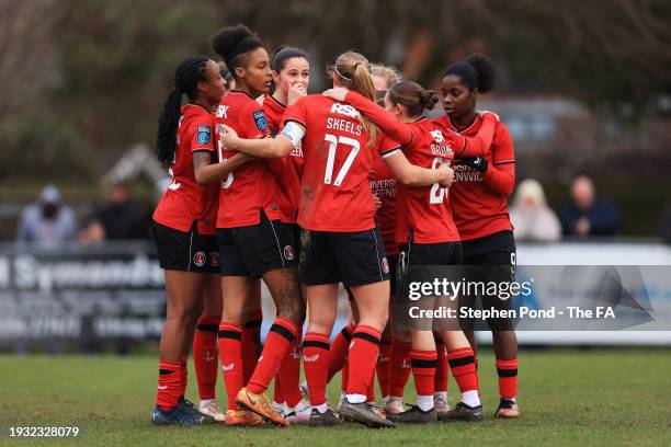 Angela Addison of Charlton Athletic celebrates with teammates after scoring their team's third goal during the Adobe Women's FA Cup Fourth Round...