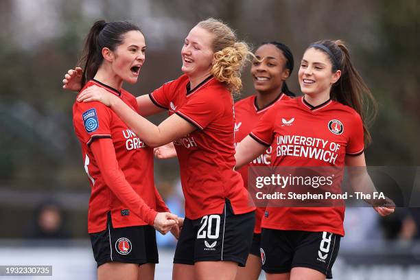 Angela Addison of Charlton Athletic celebrates with teammates Mary Bashford and Carla Humphrey after scoring their team's third goal during the Adobe...