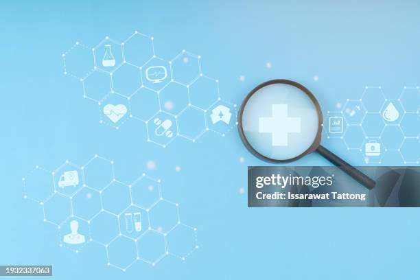 explore the health insurance concept as a person holds a magnifier and a plus, symbolizing access to medical care and well-being. ai generative concept for healthcare security. - hospital symbol stock pictures, royalty-free photos & images