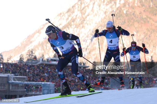 Tarjei Boe of Team Norway and Emilien Jacquelin of Team France compete during the Women 10 km Pursuit at the BMW IBU World Cup Biathlon Ruhpolding on...