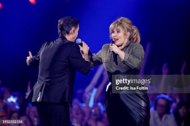 German singer and presenter Florian Silbereisen and Irish singer Maite Kelly perform during the Schlagerchampions Das grosse Fest der Besten at...