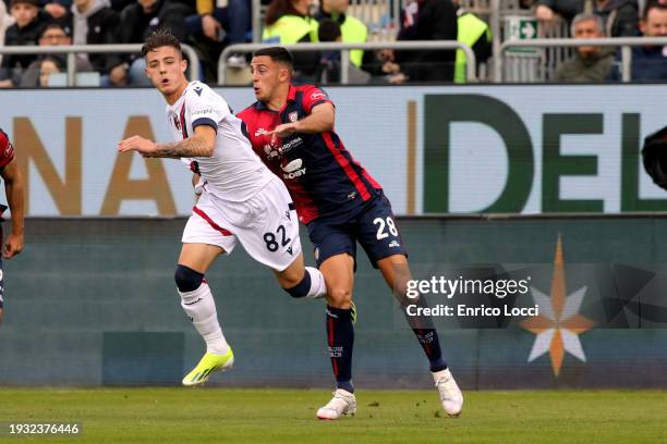 Kacper Urbanski of Bologna in contrast with Gabriele Zappa of Cagliari during the Serie A TIM match between Cagliari and Bologna FC - Serie A TIM at...