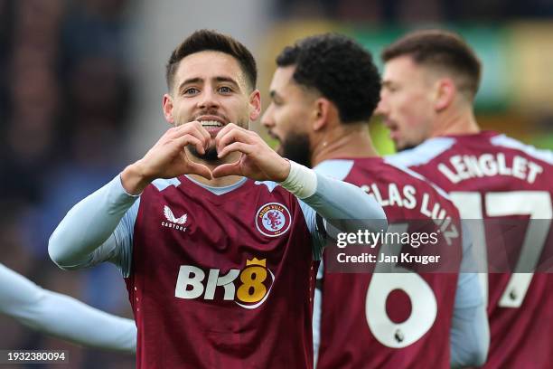 Alex Moreno of Aston Villa celebrates after scoring their team's first goal during the Premier League match between Everton FC and Aston Villa at...