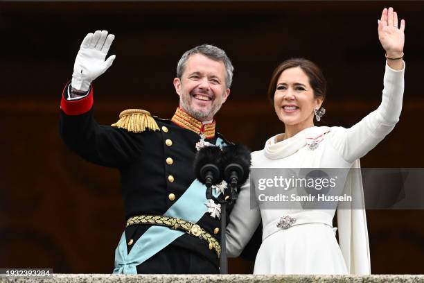 Danish King Frederik X and wife Queen Mary of Denmark wave after their proclamation by the Prime Minister, Mette Frederiksen on the balcony of...