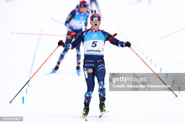 Johannes Dale-Skjevdal of Team Norway celebrates as he crosses the line after winning during the Men 12.5 km Pursuit at the BMW IBU World Cup...