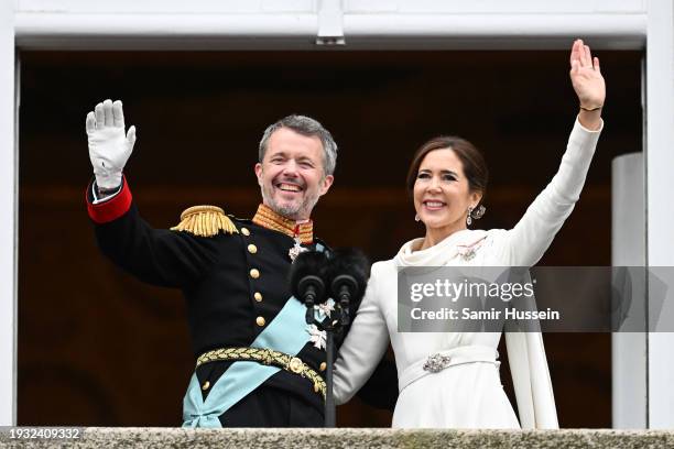 Danish King Frederik X and wife Queen Mary of Denmark wave after their proclamation by the Prime Minister, Mette Frederiksen on the balcony of...