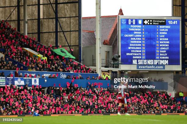 Fans of Everton hold up pink protest banners during the Premier League match between Everton FC and Aston Villa at Goodison Park on January 14, 2024...