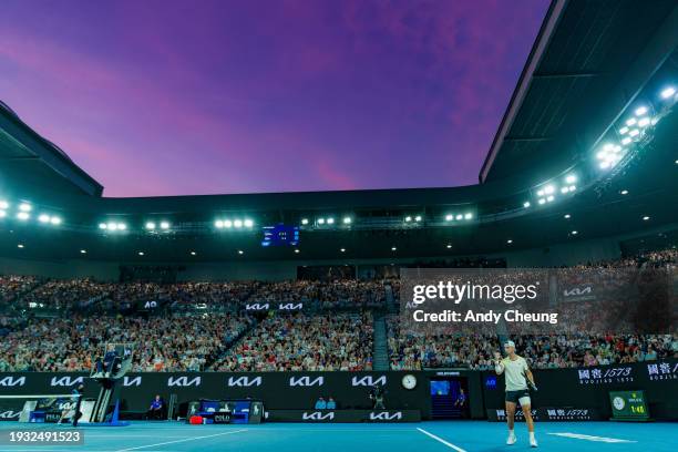 Dino Prizmic of Croatia celebrates a point in their round one singles match against Novak Djokovic of Serbia during day one of the 2024 Australian...
