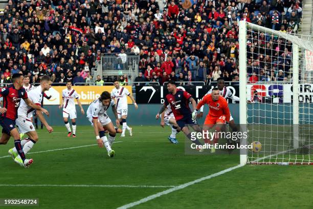 Riccardo Calafiori of Bologna scores the own goal during the Serie A TIM match between Cagliari and Bologna FC - Serie A TIM at Sardegna Arena on...